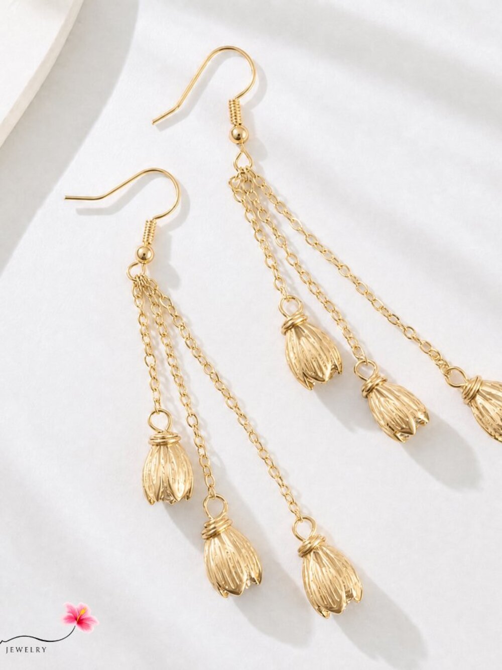 Gold Pikake triple dangle earrings